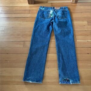 Vintage Levi’s 512 mid blue jeans with patchwork repairs handmade quilt
